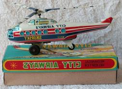 Ancien jouet m&eacute;canique h&eacute;licopt&egrave;re SIKORSKY T&ocirc;le City Ai