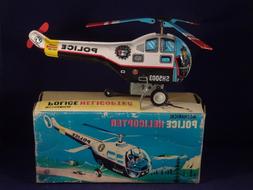 Ancien jouet t&ocirc;le h&eacute;licopt&egrave;re police m&eacute;canique SH 5003 e