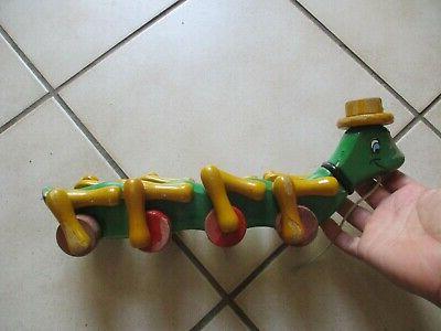 ancien jouet de plancher a tirer en