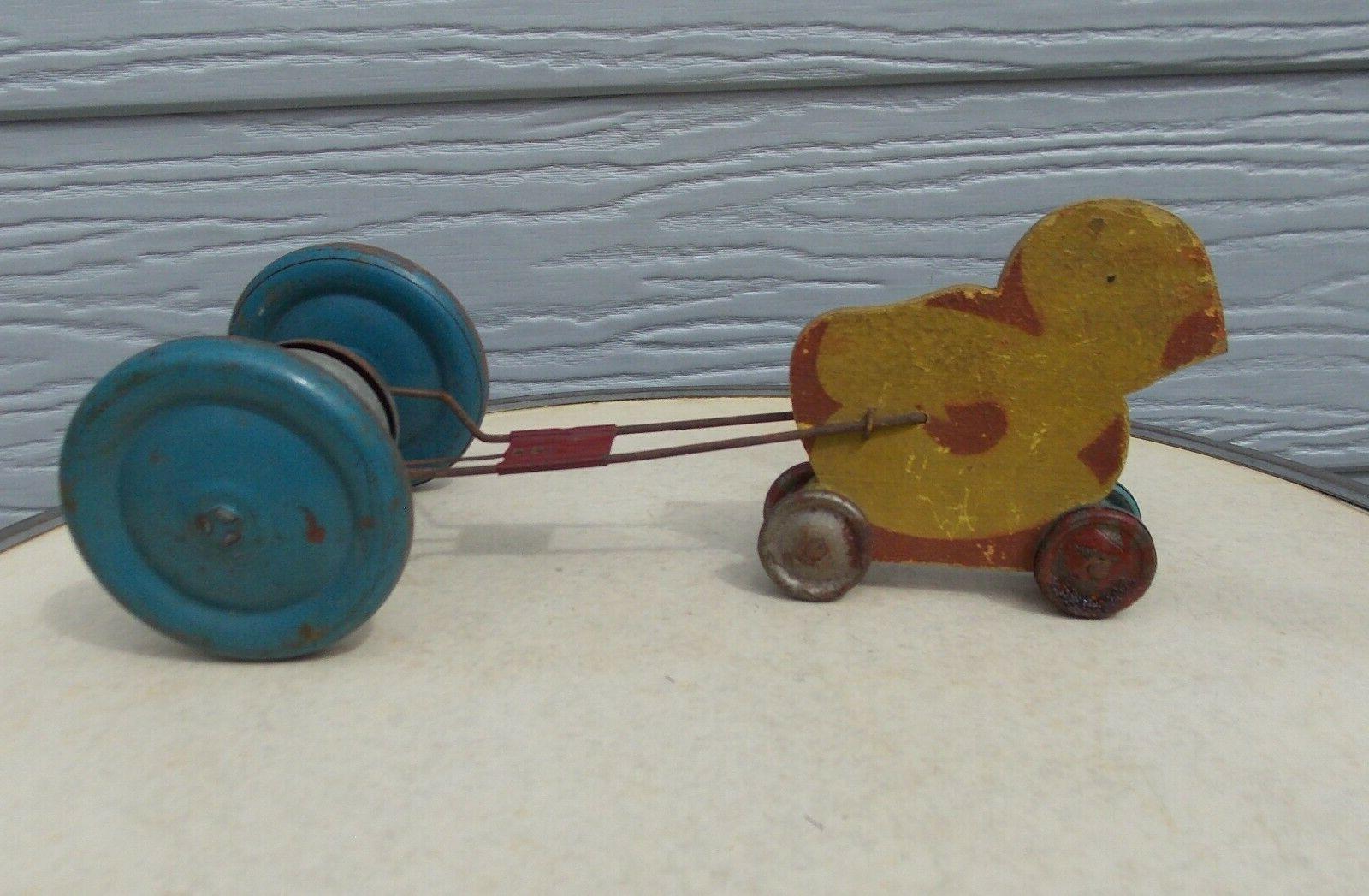 ancien jouet en bois et fer pour