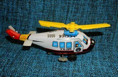 ancien jouet mecanique helicoptere en tole police