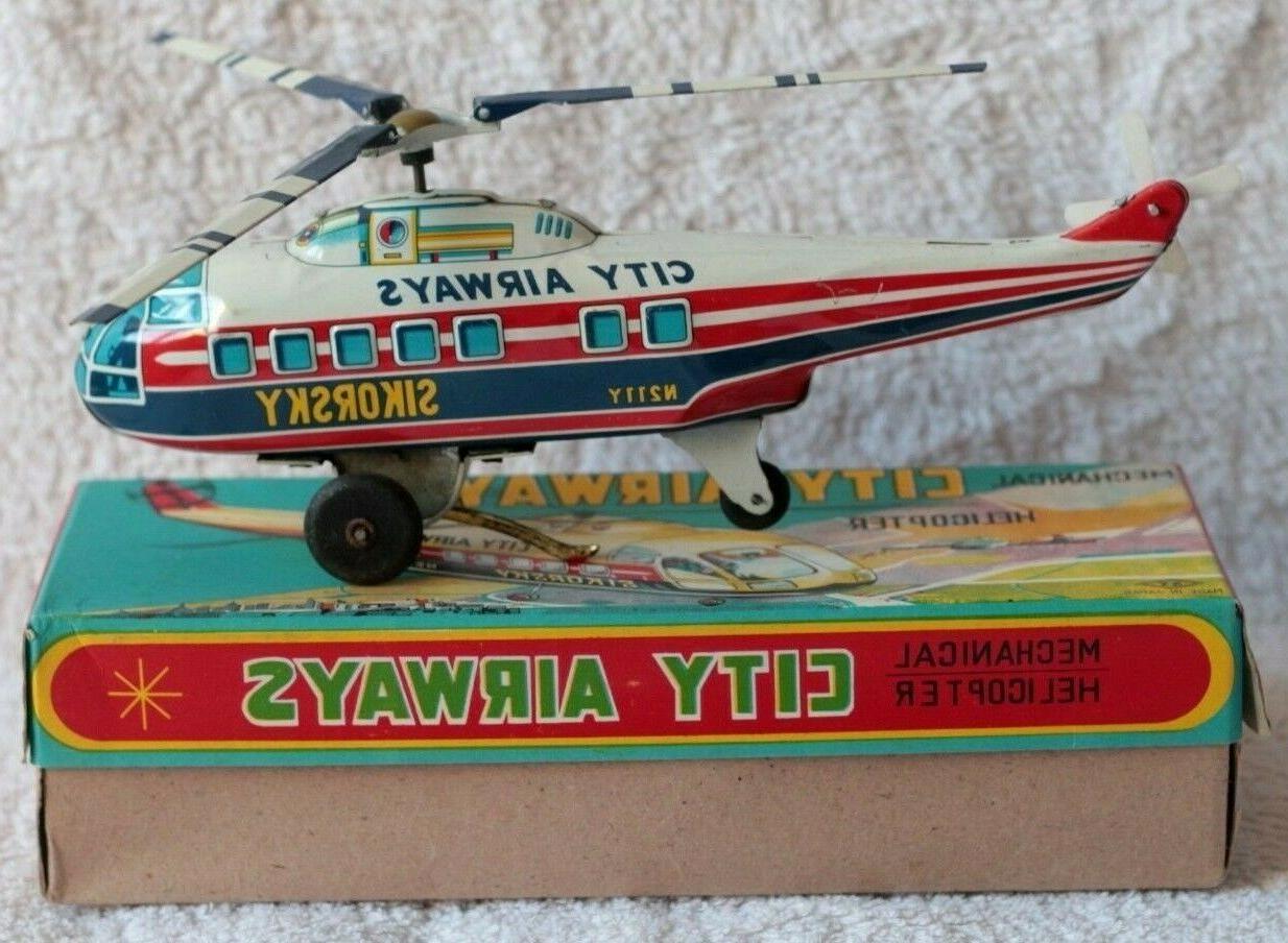 ancien jouet mecanique helicoptere sikorsky tole city
