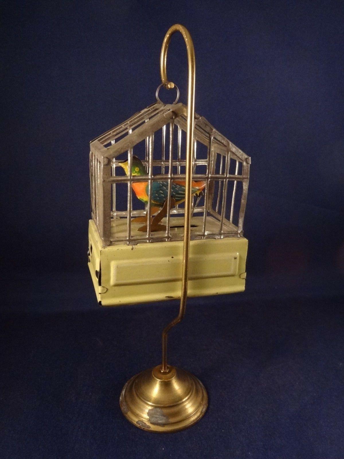 ancien jouet mecanique tole oiseau siffleur en