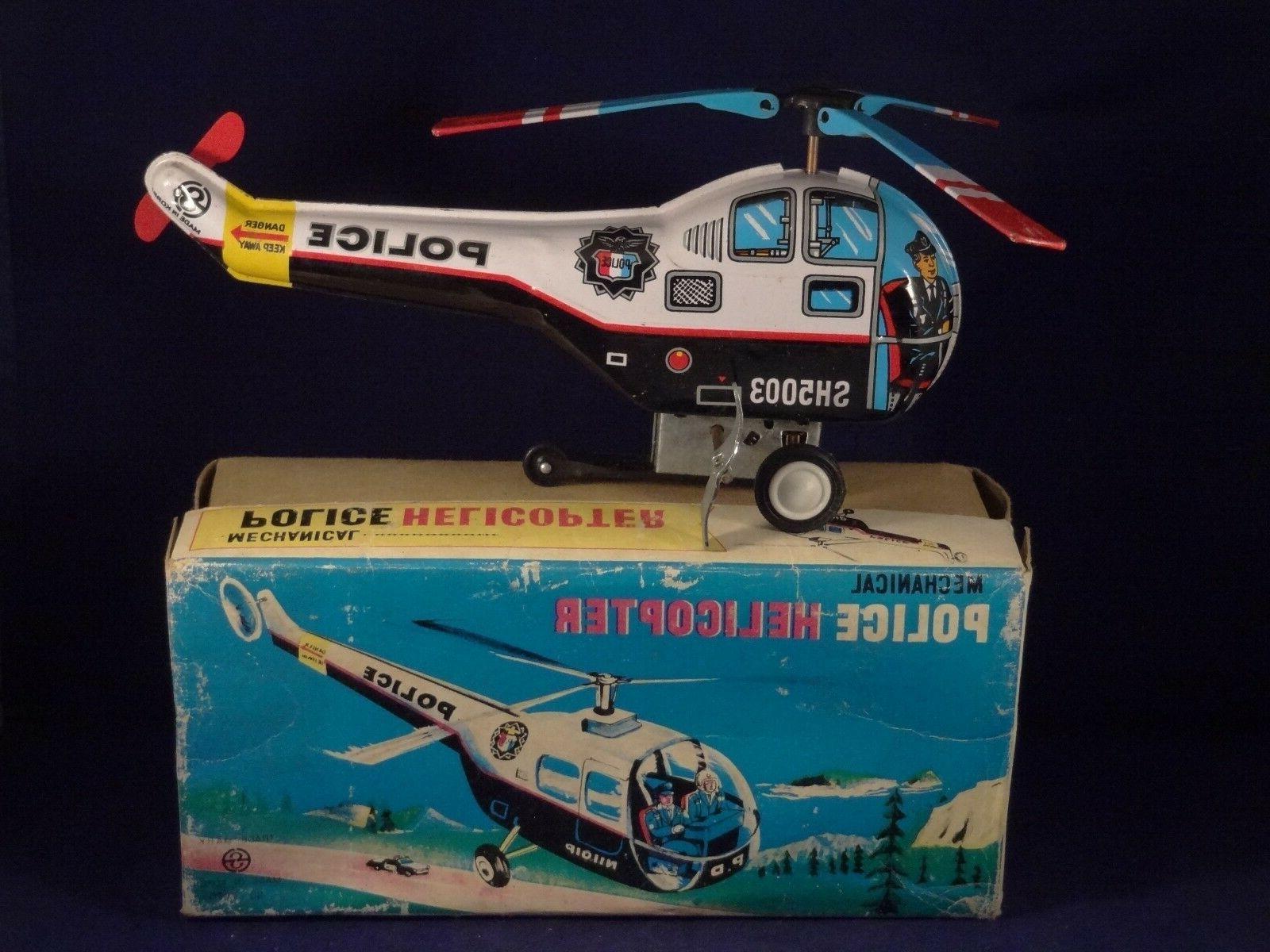 ancien jouet tole helicoptere police mecanique sh