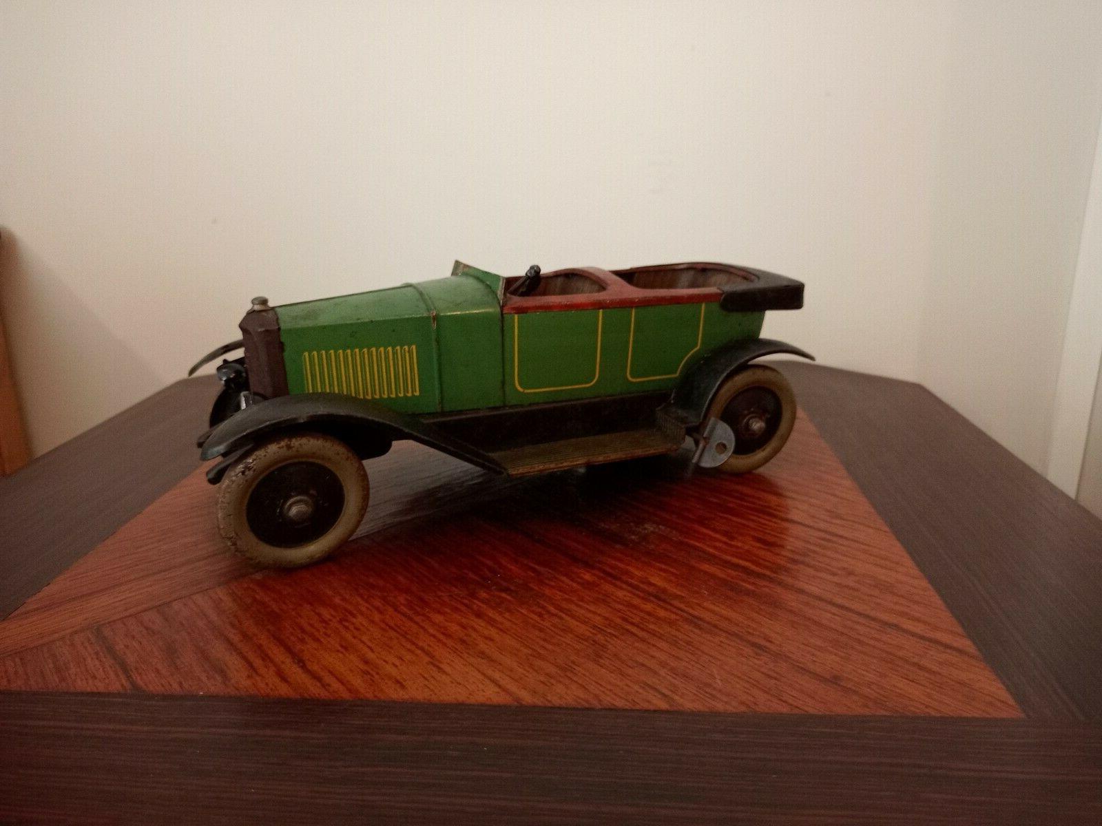 ancienne grande voiture a ressort jouet tole