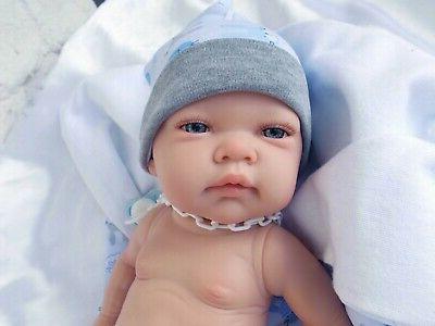 bebe sexue garcon et tenue tetine jouet