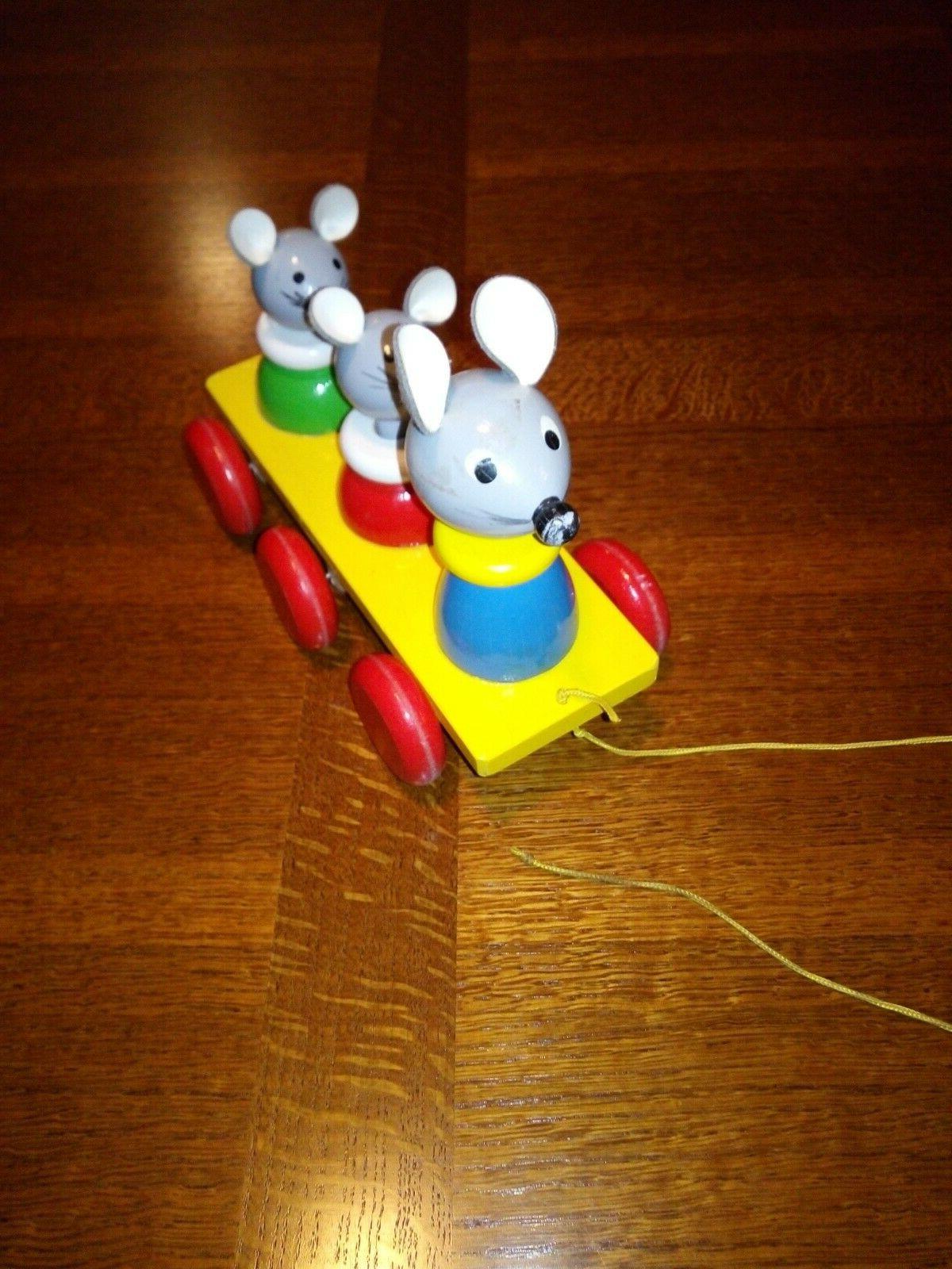 jouet en bois clown a trainer a