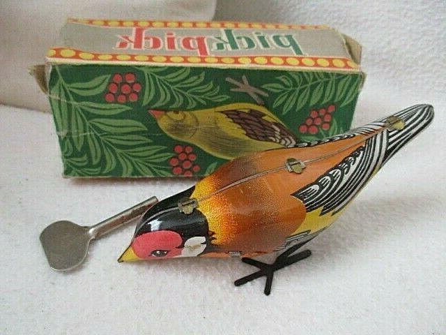 jouet oiseau pickpick en tole a cle