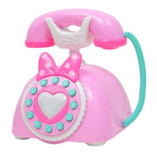 jouet retro en plastique rose de telephone
