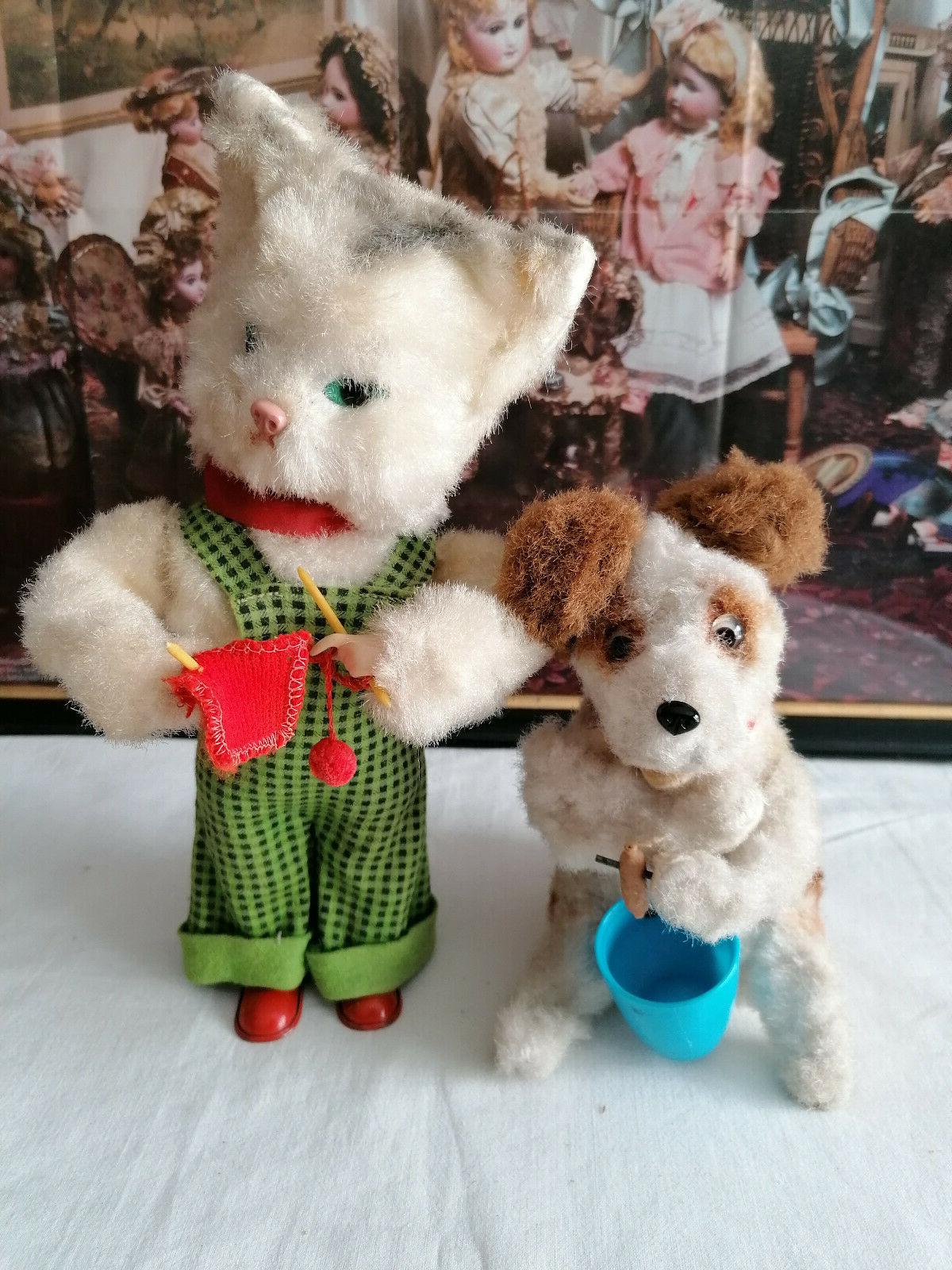 lot de 2 jouets mecaniques a remonter